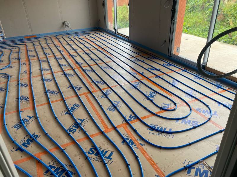 Pose d'une PAC avec plancher chauffant sur un pavillon neuf à côté du Havre 76