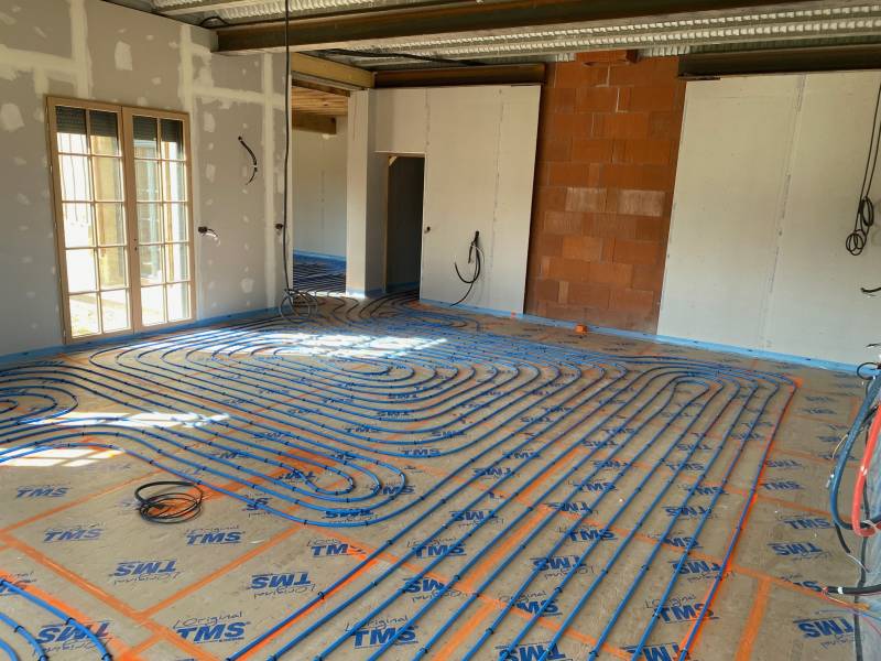 Chauffagiste RGE pour un plancher chauffant raccordé sur une géothermie à côté de Deauville 14